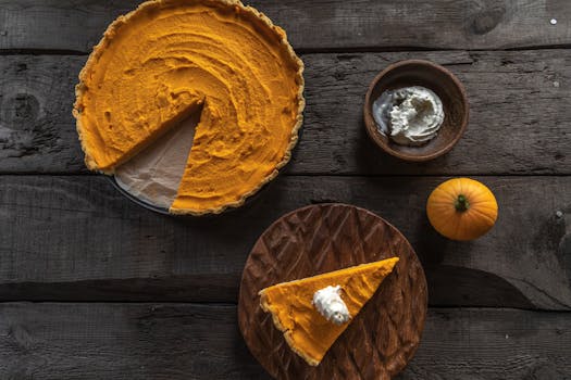 pumpkin pie topped with whipped cream