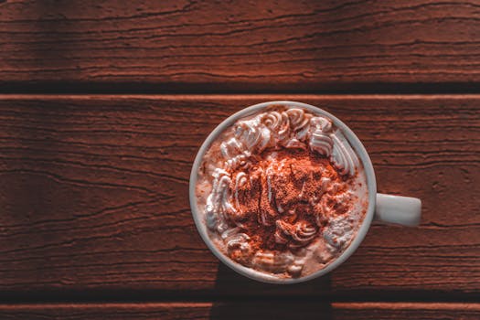 pumpkin spice latte topped with whipped cream