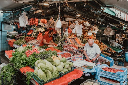 A colorful array of seasonal fruits and vegetables displayed at a farmers market