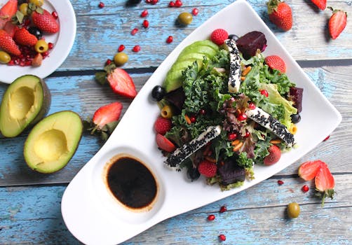 colorful winter salad with kale and pomegranate